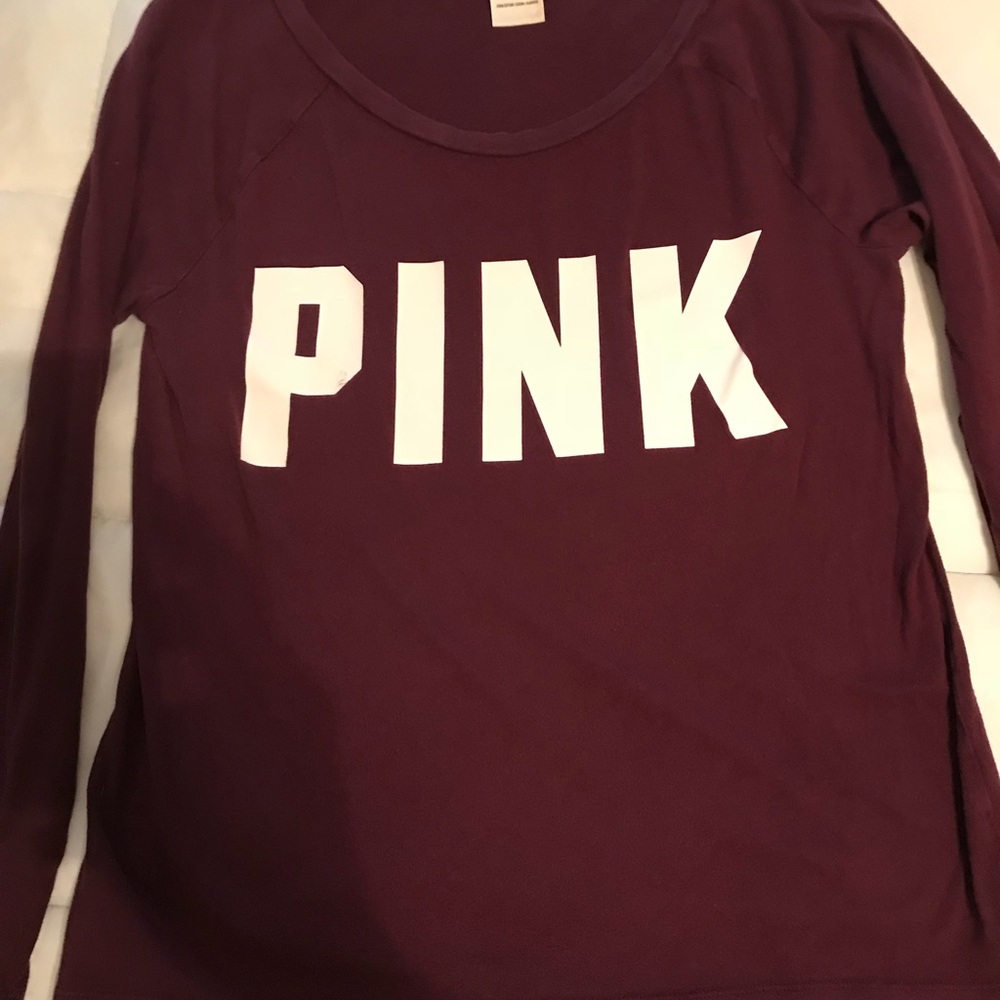 Pink long sleeve shirt.